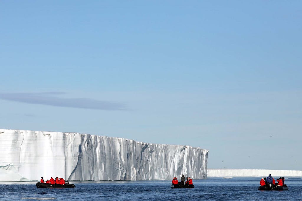 Zodiacs in front of the Brasvellbreen Glacier