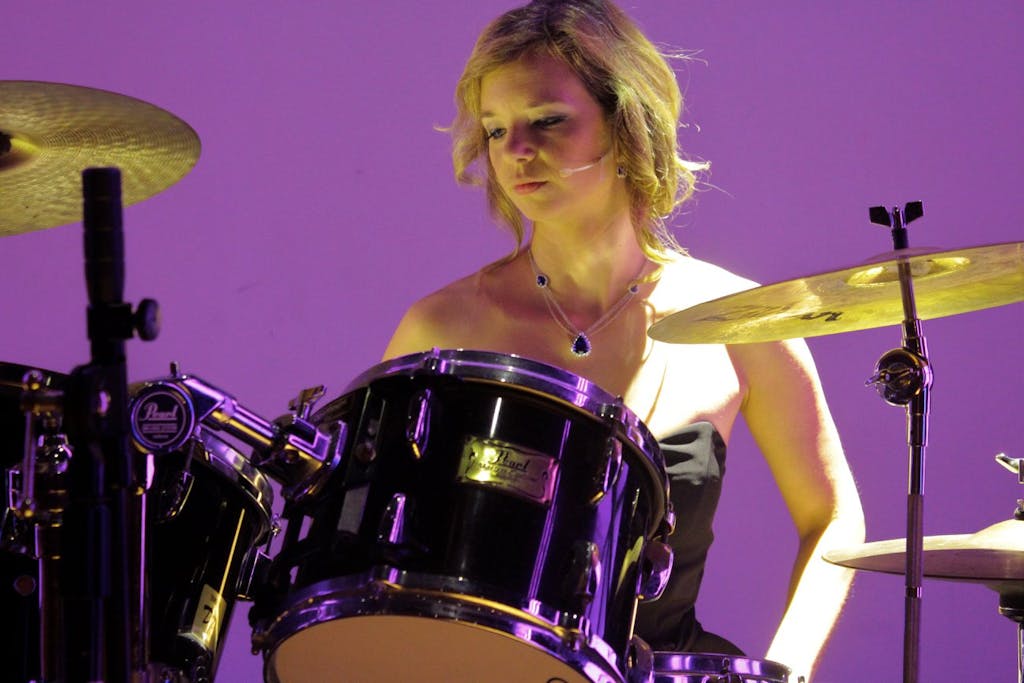 Helena Lackner playing the drums